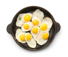 Frying pan with tasty fried quail eggs isolated on white background