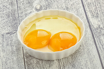 Chicken egg in the bowl