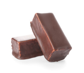 Tasty bird's milk candies on white background