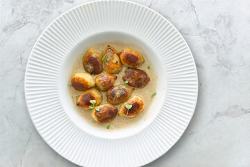 Crispy gnocchi stuffed with mushrooms(boletus edulis) with truffle sauce