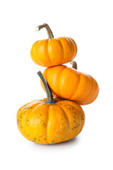 Stack of ripe Halloween pumpkins on white background