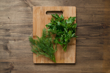Fresh herbs on a wooden table