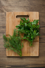 Fresh herbs on a wooden table