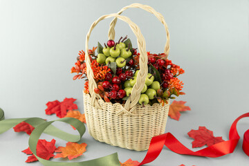 autumn style collage with flowers, leaves on a light grey background with free space for your text 