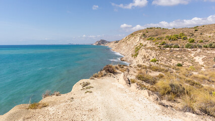Cliffs and Mediterranean sea in the south of Spain. White coast Spain. Valencian Community.