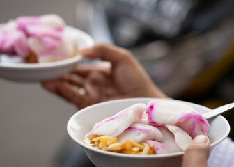 Two bowl of highly refreshing Rujak Es Krim or ice cream rojak, a traditional dessert from Yogyakarta, Indonesia. Focus on one bowl in the front