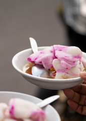 Two bowl of highly refreshing Rujak Es Krim or ice cream rojak, a traditional dessert from Yogyakarta, Indonesia. Focus on one bowl in the front