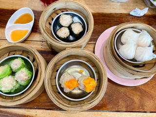 Dim sum, top view and text input area, dim sum (Chinese food) in steamed bamboo is popular all over the world.