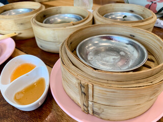 Dim sum, top view and text input area, dim sum (Chinese food) in steamed bamboo is popular all over the world.