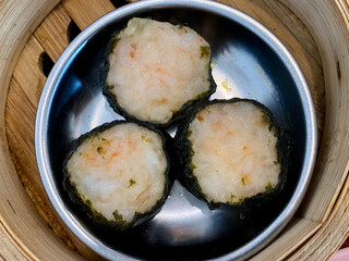 Dim sum, top view and text input area, dim sum (Chinese food) in steamed bamboo is popular all over the world.