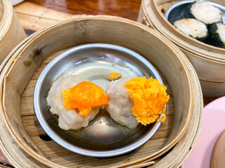 Dim sum, top view and text input area, dim sum (Chinese food) in steamed bamboo is popular all over the world.