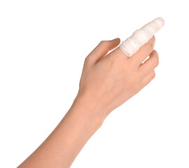 Woman with finger wrapped in medical bandage on white background, closeup
