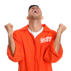 Emotional prisoner in orange jumpsuit on white background