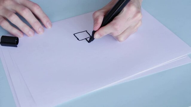 Hand Drawing Genogram On White Paper With Black Pen. High Angle Shot