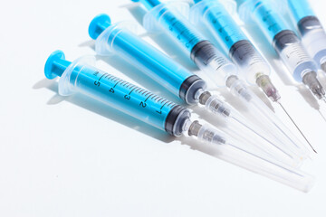 Disposable plastic syringe prepared for injection and vaccination in the hospital. The concept of medicine and health