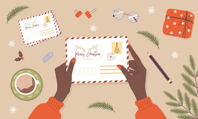 Female hands holding envelope. African woman making handmade greeting card. Sending or receiving Christmas postcard. Top view. Vector illustration in flat cartoon style. Winter holiday wishes.