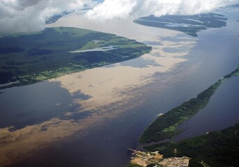 Meeting of the Rio Negro with the Rio Solimoes near Manaus. Here you can clearly see how the two...