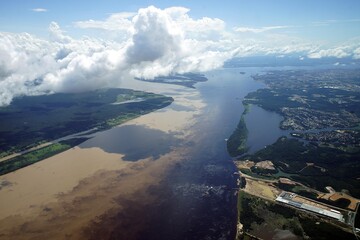Meeting of the Rio Negro with the Rio Solimoes near Manaus. Here you can clearly see how the two...