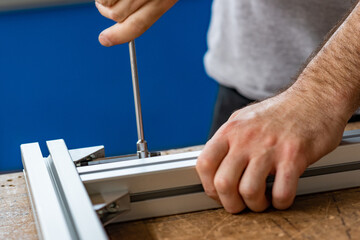 close up of a person using a saw