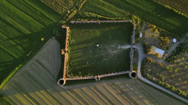 A view from the top of a medieval quadrangular fortress The Fortress of Bashtove, Albania.