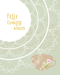 Feliz Cumpleanos Happy Birthday, written in spanish language, postcard vintage collage with lace and cup coffee flower.