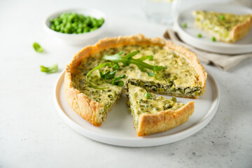Homemade green pea quiche with cheese