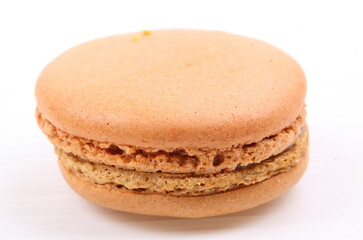 Brown macaron isolated in white background