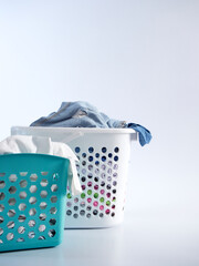 Basket with dirty clothes for washing