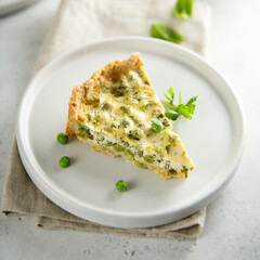Homemade green pea quiche with cheese