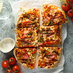 Traditional homemade meat pizza with capsicum