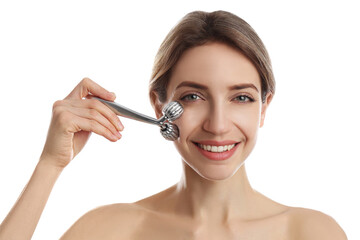 Young woman using metal face roller on white background
