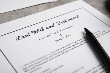 Last will and testament on light grey table, closeup