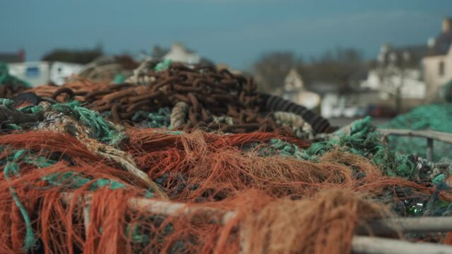 Pile of Tangled Up Professional Nylon Fishing Net with Buoys and Markers