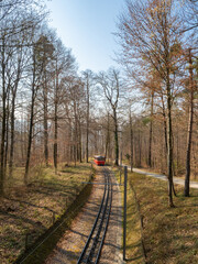 Fototapeta premium Zurich, Switzerland - March 26th 2022 - Red waggon of the Dolder cog railway 