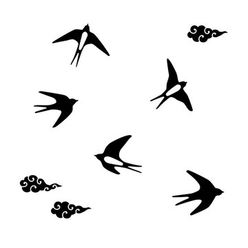 set of silhouettes of swallow birds