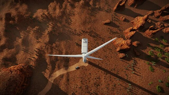 Drone view of maintenance workers on top of a desert Wind Turbine, 4K