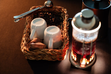 French press with coffee set and coffee beans.