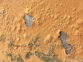 Closeup of peeling painted wall