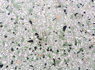 rough texture surface of exposed aggregate finish, Ground stone washed floor, made of small sand stone in light brown color