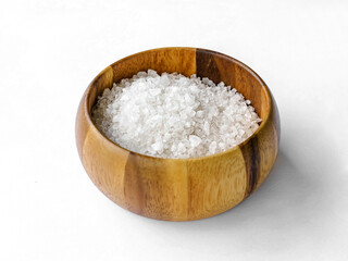 Fototapeta na wymiar Sea salt in a wooden salt shaker. Salt cellar