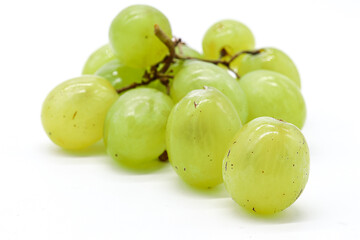 bunch of green grapes on white background