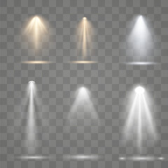 Set of golden spotlight isolated on transparent background. Glowing light effect with gold rays and beams. Scene floodlight spotlight stage beam.