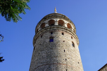 Istanbul, Turkey - Agust 08, 2022: The famous Galata tower in Istanbul, Turkey. This is a popular tourist attraction in the city. 
