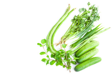 Fresh vegetables variety, Cucumber, ,Spring onion, Peppermint or Mentha x piperita, Ginger leaves, Yardlong bean, Coriander or cilantro isolated on white background,Organic vegetables, Herbal plant, F