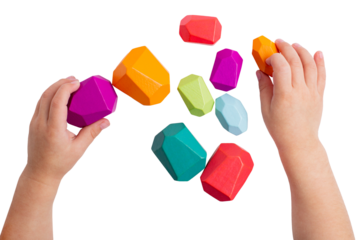 Wooden colorful  toy blocks isolated in kid hands , rainbow color. Baby development. Design element pastel