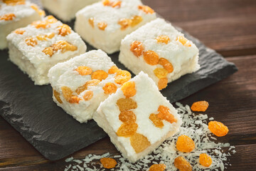 Arabic traditional coconut candies with raisins. Egyptian oriental desserts usually eaten during 