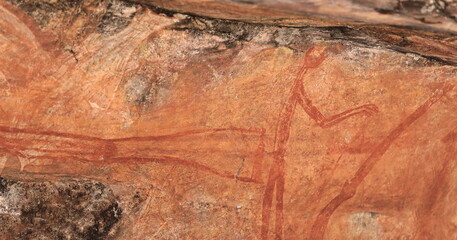 Aboriginal rock art: contact period painting of man with rifles. Ubirr-Kakadu-Australia-192