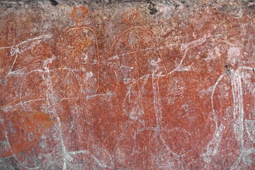 Aboriginal rock art: men punishing a young girl from another clan. Ubirr-Kakadu-Australia-194