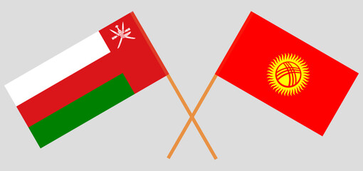 Crossed flags of Oman and Kyrgyzstan. Official colors. Correct proportion
