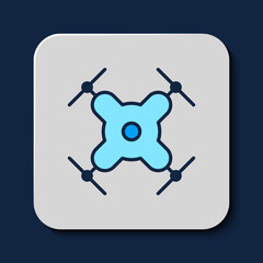 Filled outline Drone flying icon isolated on blue background. Quadrocopter with video and photo camera symbol. Vector